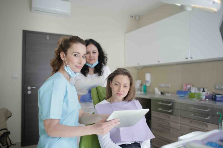 dental office staff around a patient